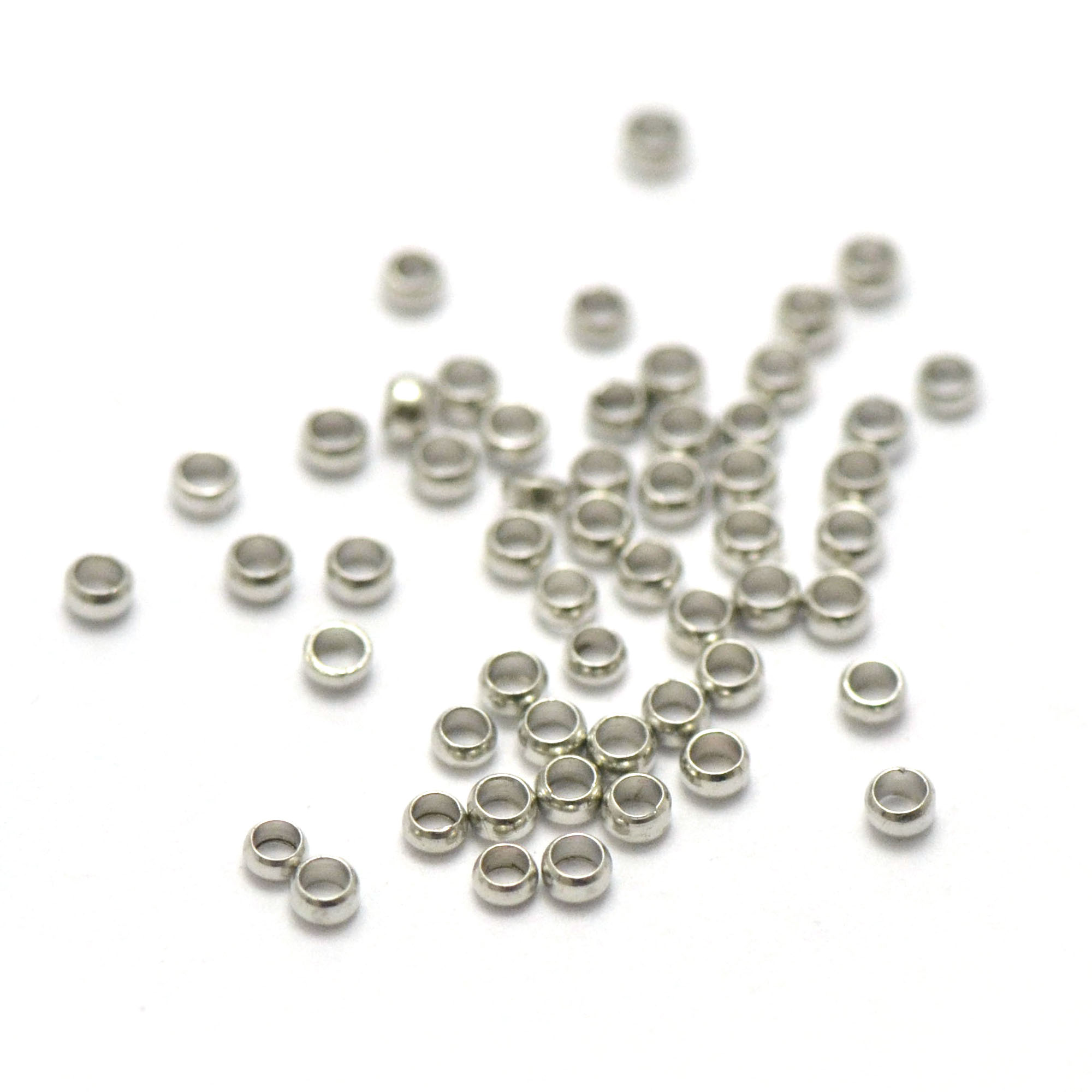 5g environ 240 perles à écraser 2.5 mm, argenté