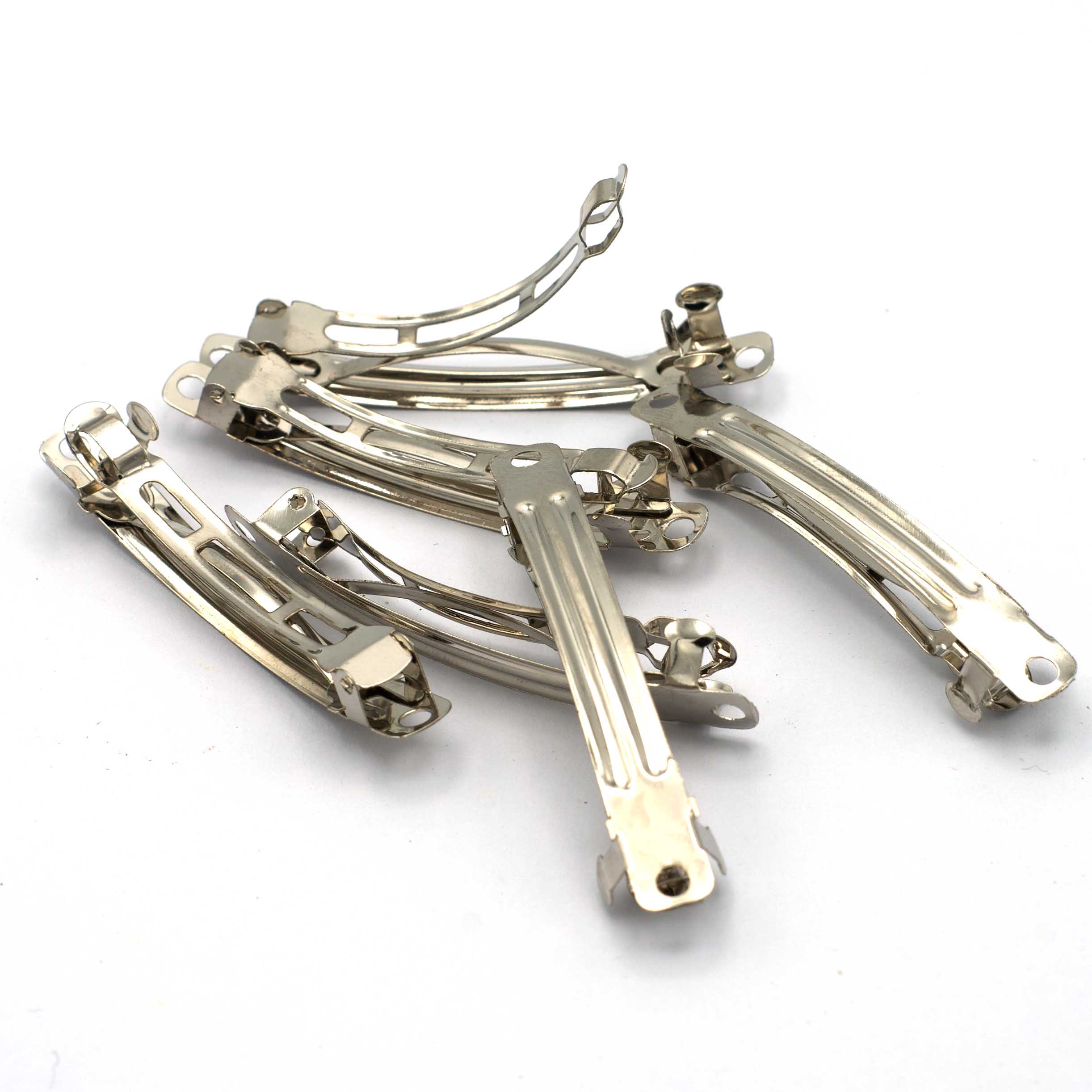 10 barrettes 58x7x7 mm à ressort pour cheveux , argenté