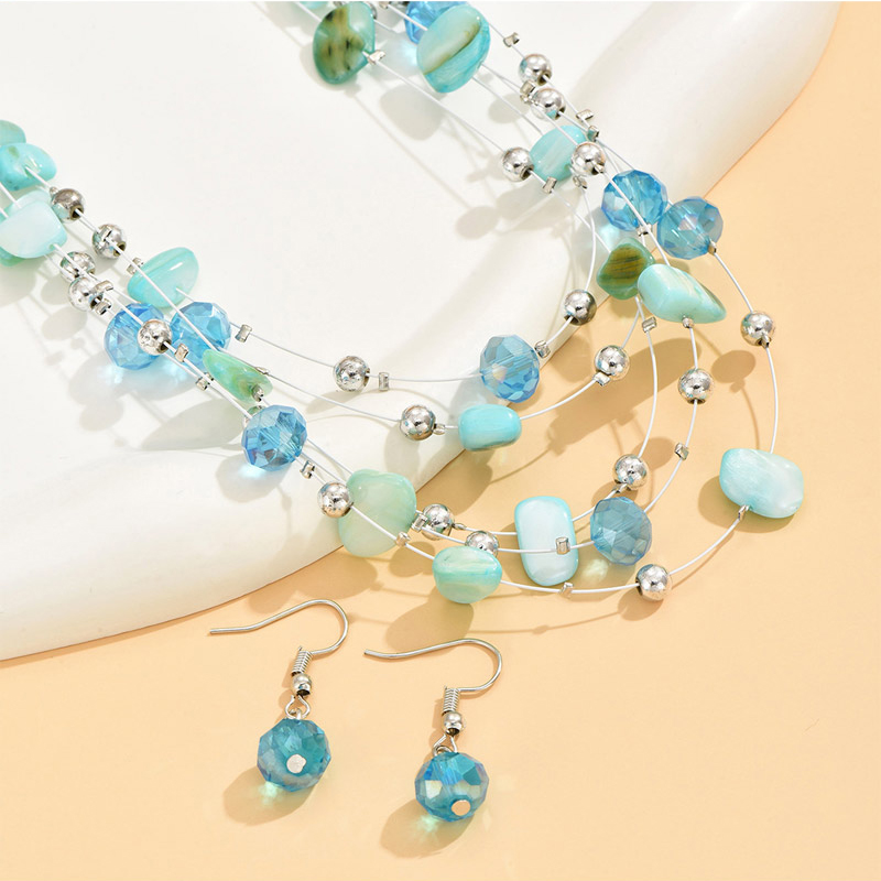 collier multicouche en perles de cristal et coquillage