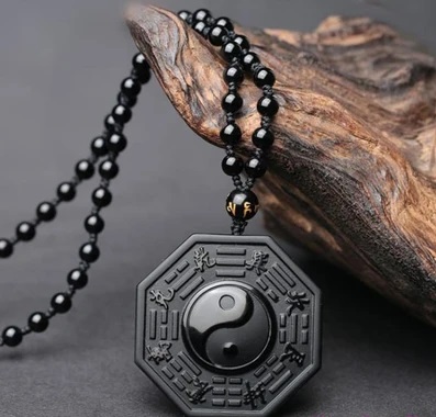 2. collier-et-pendentif-sculpte-yin-yang-en-obsidienne-noire-karma-yoga-shop_910_400x