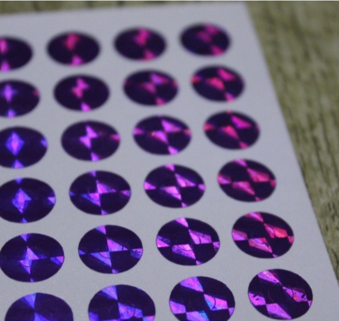 Disco - 24 petits oeillets papier violet