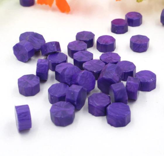 granulé de cire violette