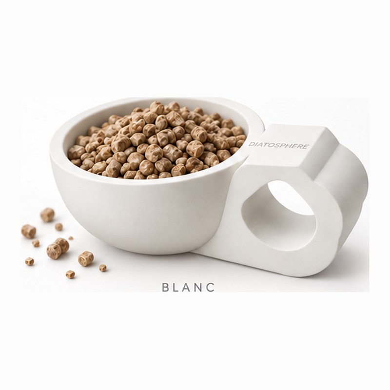 Cuillère doseuse Diatosphère blanche remplie de granulés