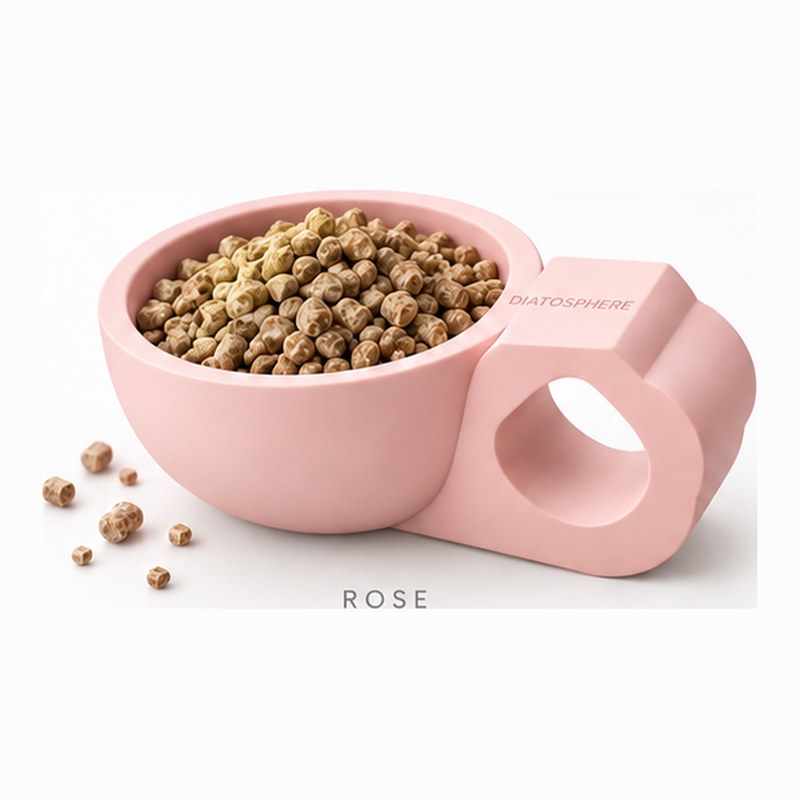 Cuillère doseuse Diatosphère rose remplie de granulés