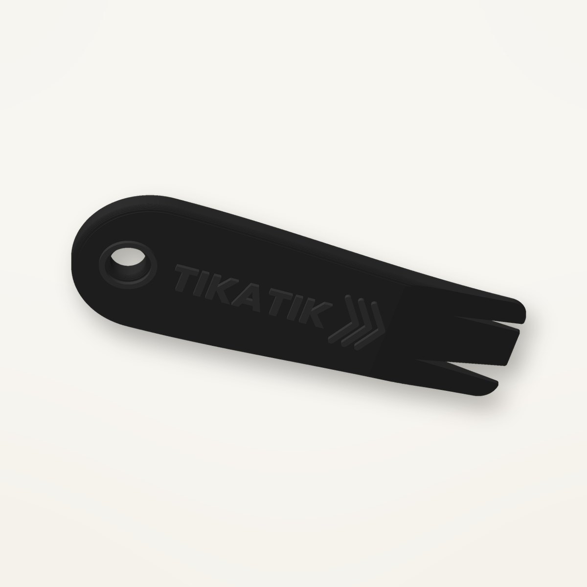 Tire-tique Tikatik noir avec écriture en relief