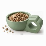 Cuillère doseuse Diatosphère vert sauge remplie de granulés