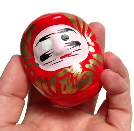 Daruma rouge, poupée japonaise porte-bonheur chance et réussite