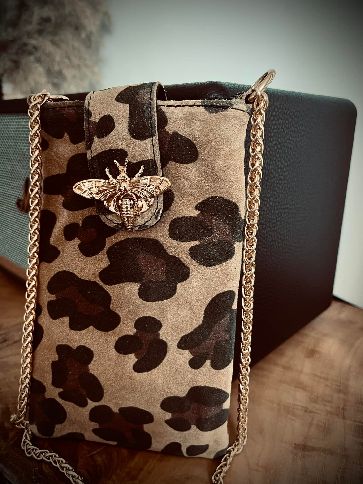 Pochette leopard outlet cuir