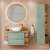Oria_vert_salle_de_bain_pack_arrondie_meuble_simple_vasque_100cm_ambiance