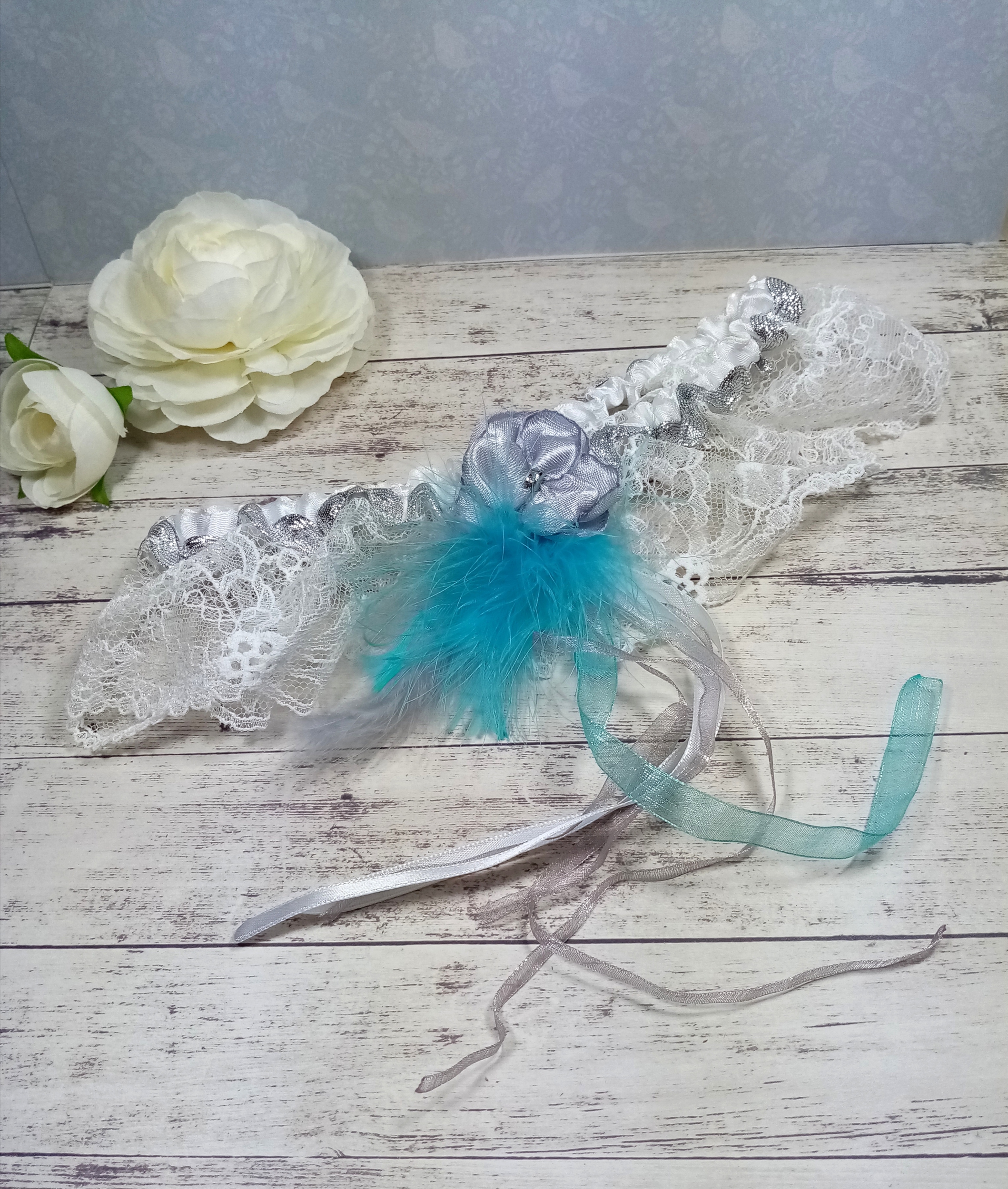 Jarretière de mariage personnalisé dentelle plumes turquoise