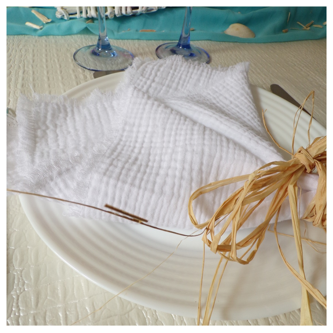 serviette de table blanche tissu gaze de coton franges