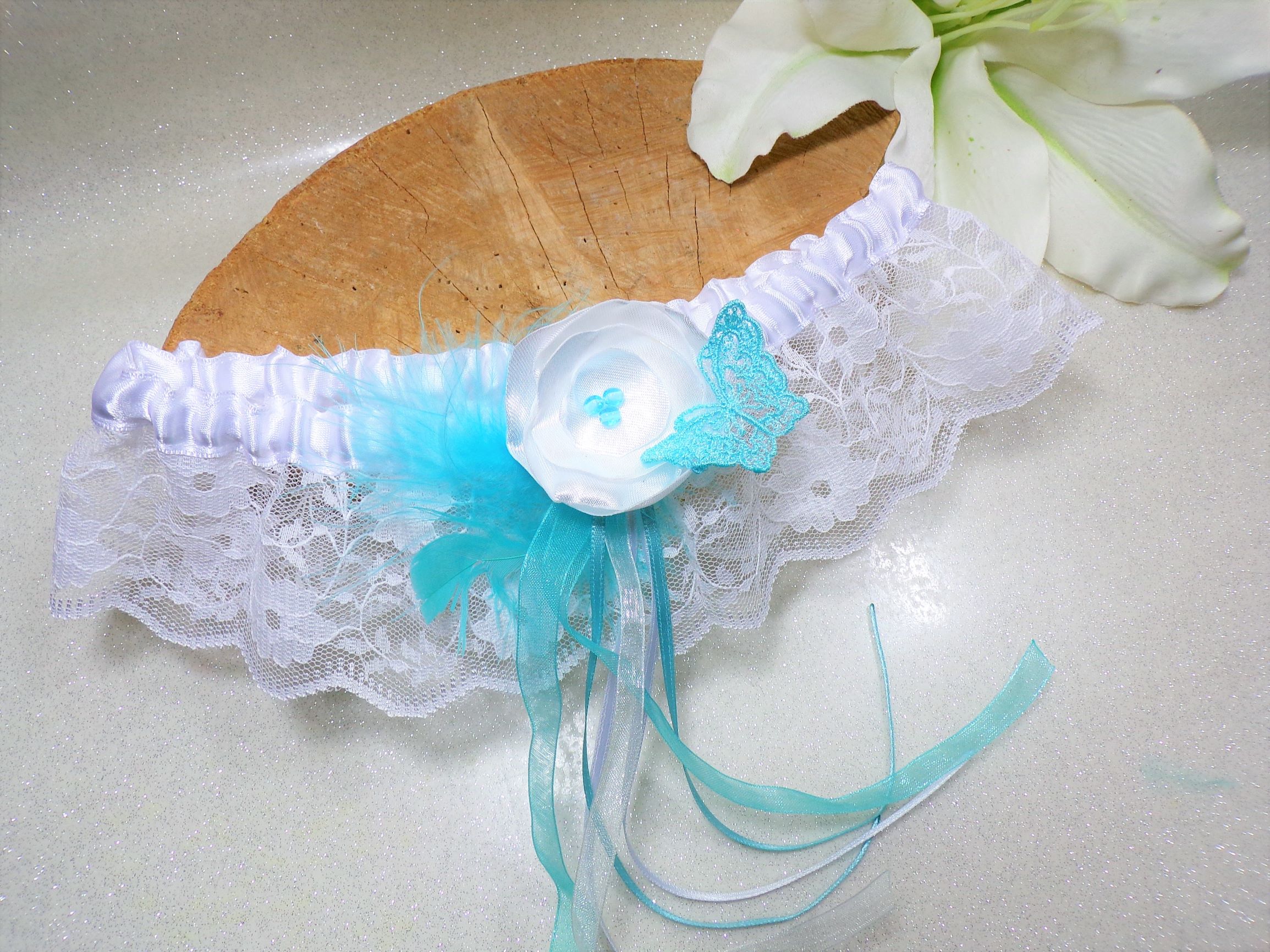 Jarretière mariage papillon dentelle plues turquoise blanc