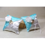Petits coussins d'alliances coquillage turquoise blanc