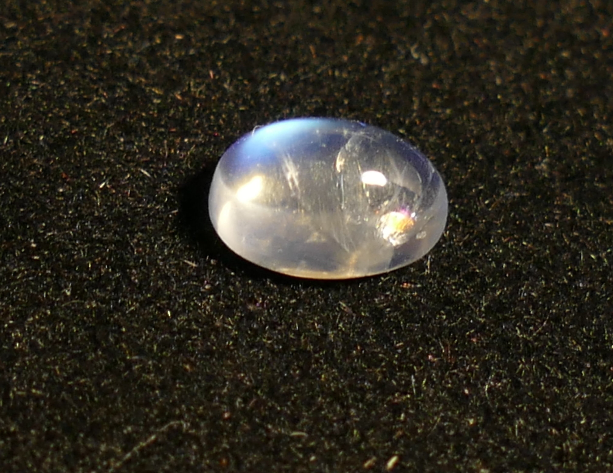 7x5mm Pierre de lune arc-en-ciel d'Inde 0.78ct cabochon ovale - Gemmes