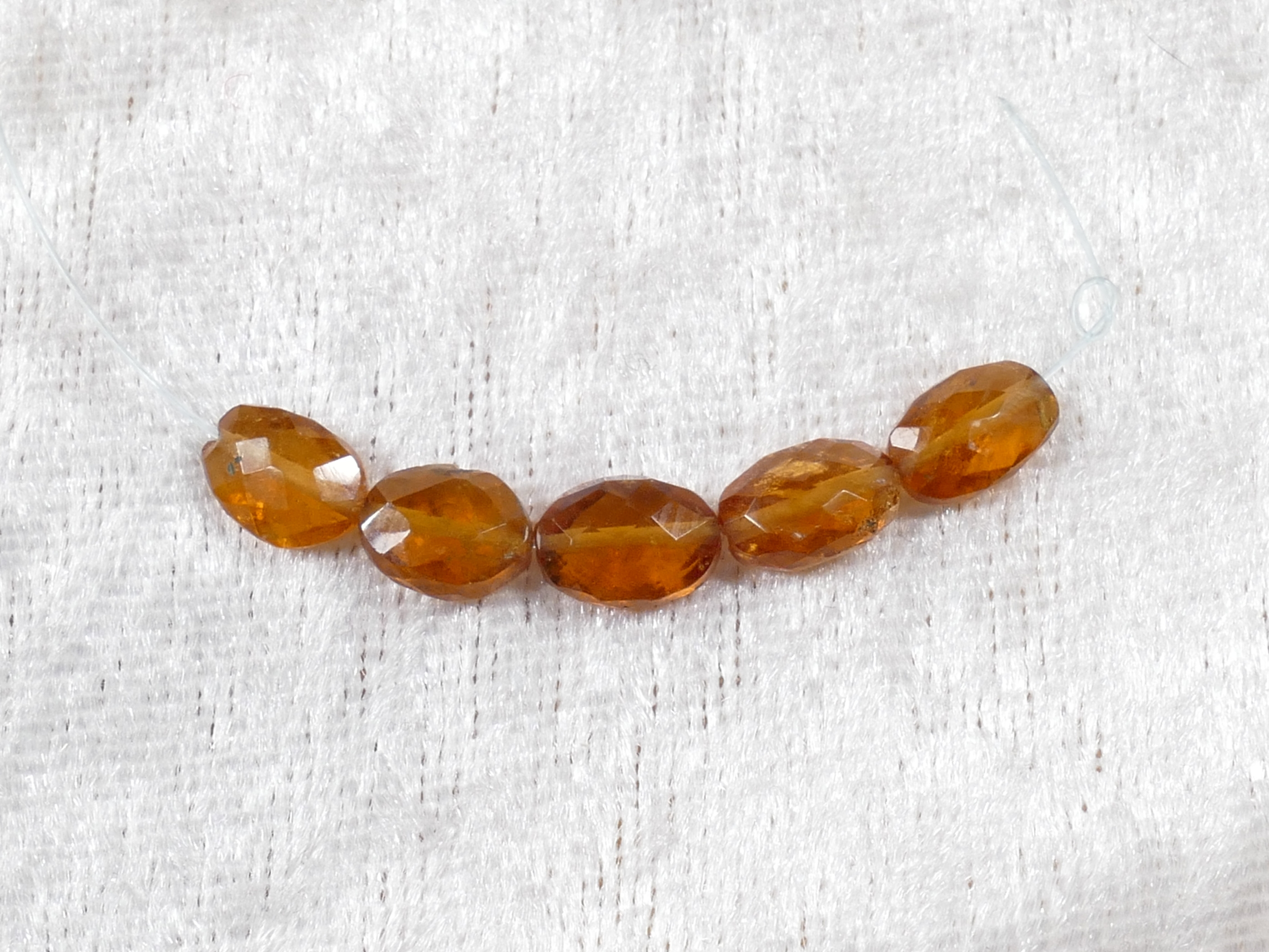 perles de grenat orange spessartite naturel ovale facettée
