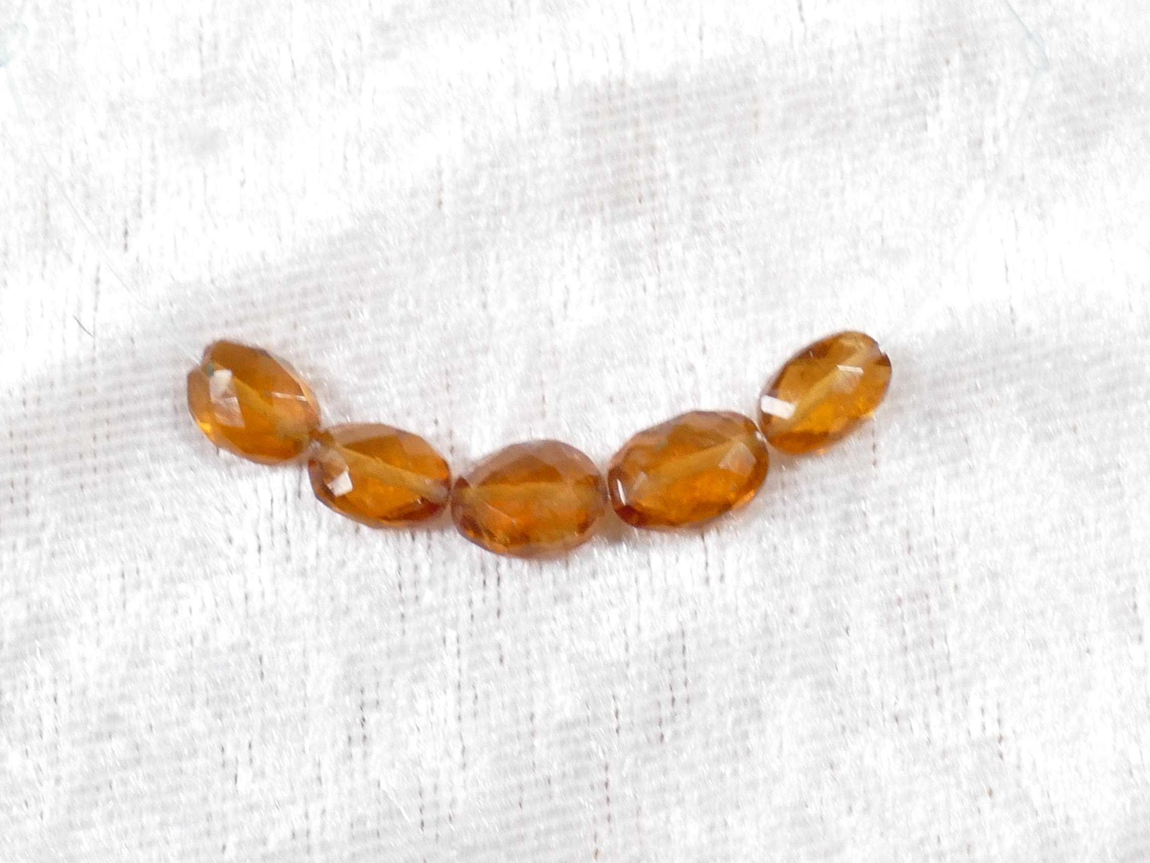 perles de grenat orange spessartite naturel ovale facettée