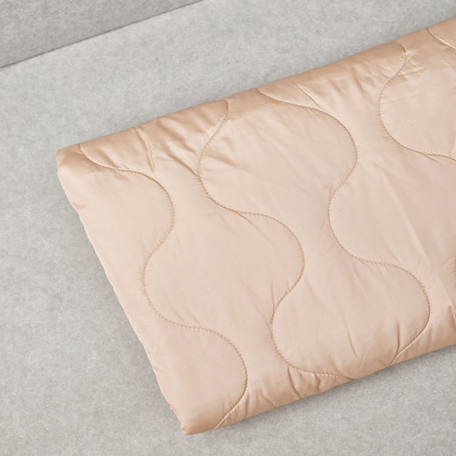 Tissu matelassé doudoune double-face chaud et déperlant coloris dune 20 x 140 cm