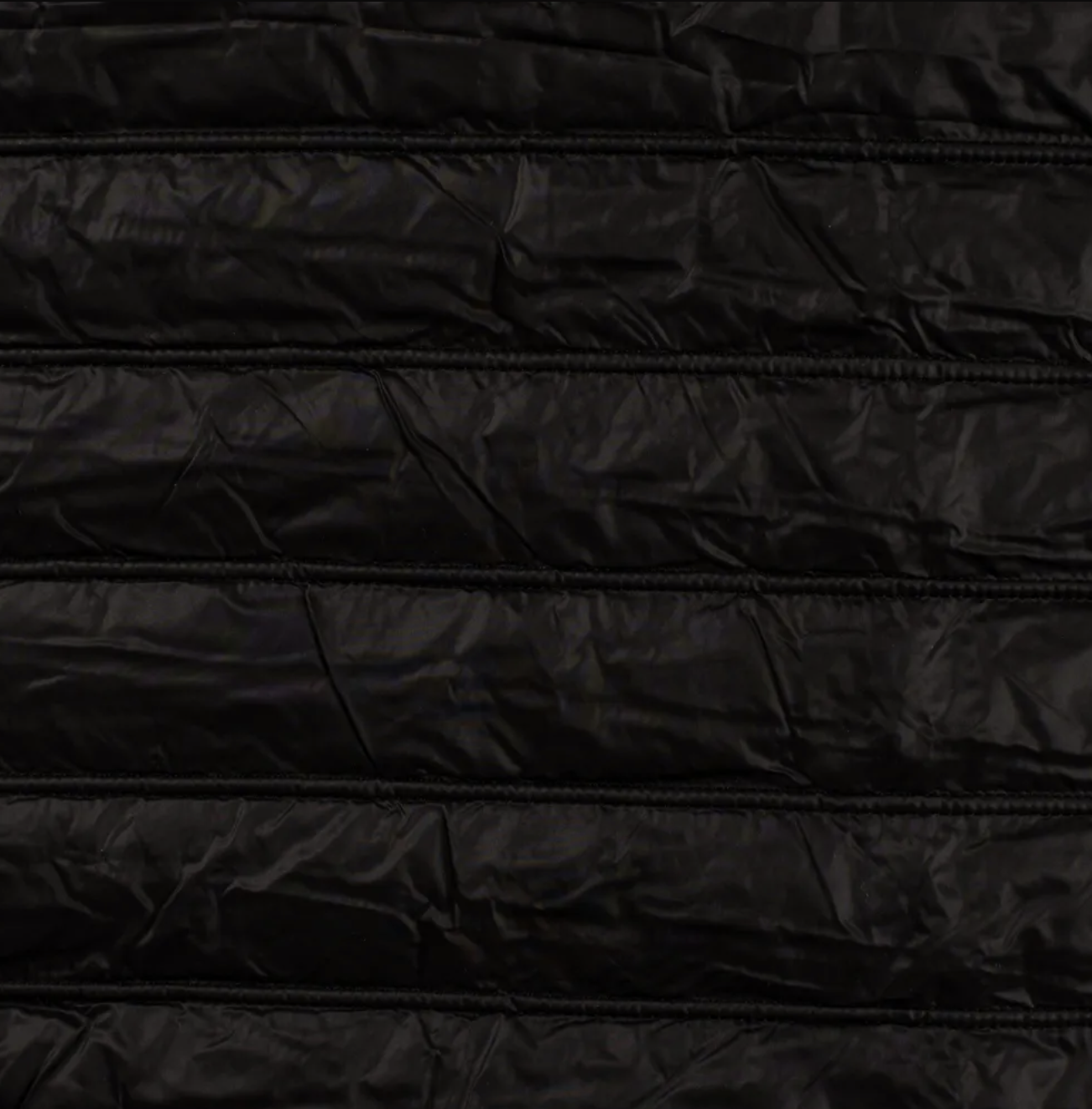 COUPON de Tissu matelassé doudoune coloris noir 80 x 130 cm
