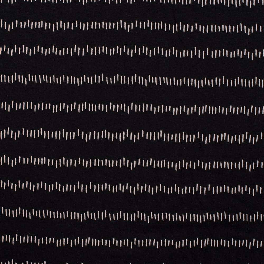 Jersey Tirets irréguliers fond noir 20 x 145 cm