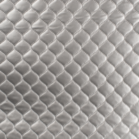 Tissu matelassé volutes coloris argent 20 x 140 cm