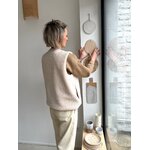 gilet-de-berger-poches-prises-en-couture-1