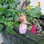 bebe-dans-un-sac-miniature-figurine-bapteme-naissance-2