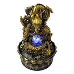 fontaine dragon doré avec boule
