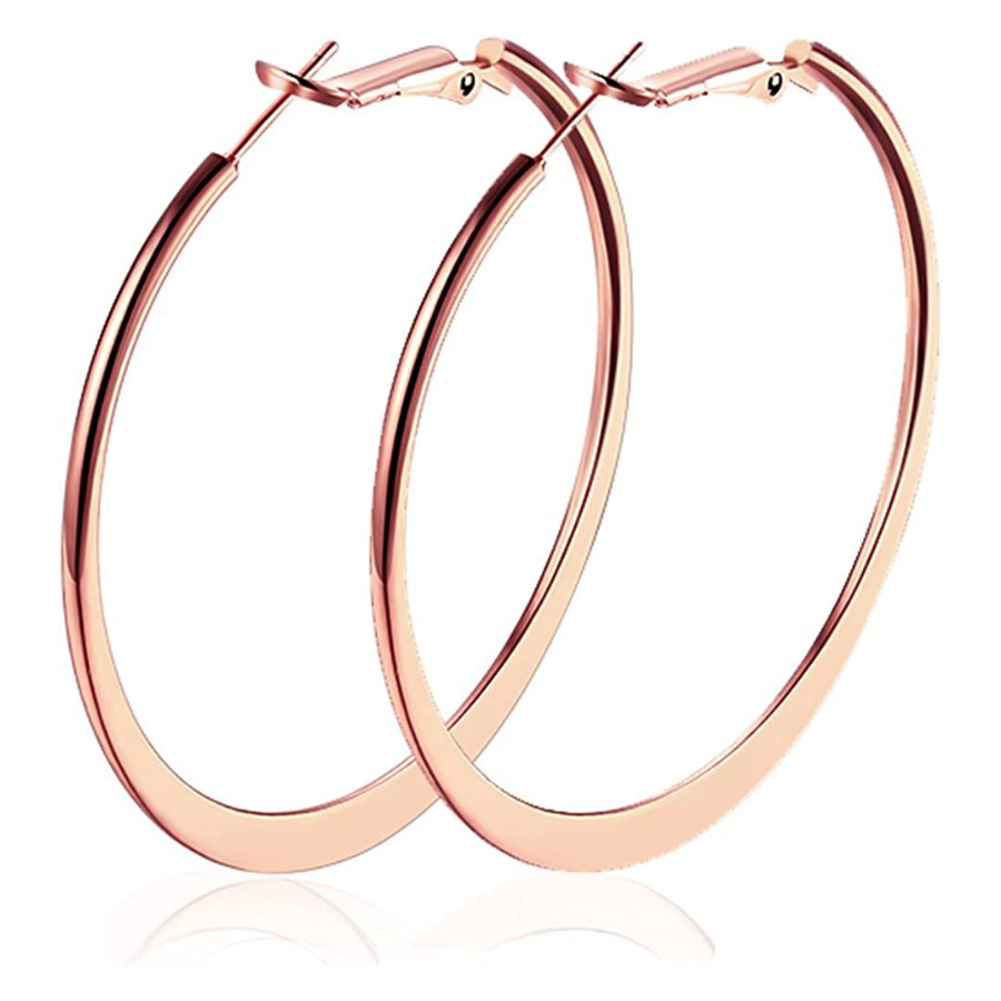 Boucles d\'oreilles créoles en or rose pour femmes : un accessoire indispensable pour toutes les occasions