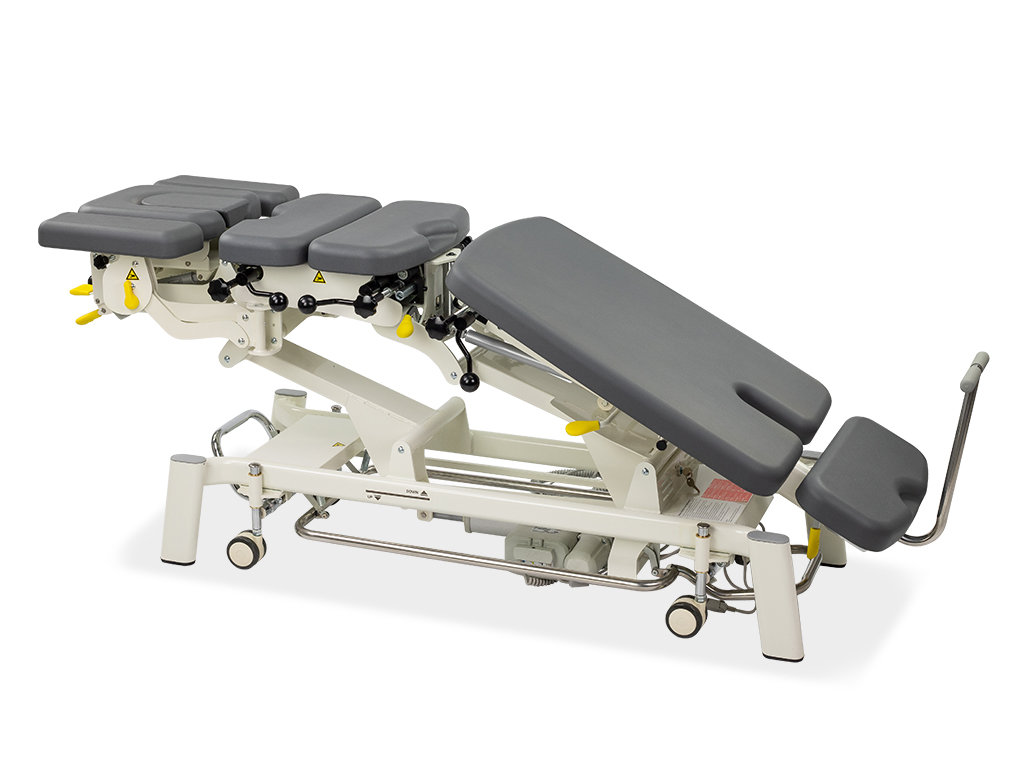 table de chiropraxie électrique habys avec drops ou toggle mécaniques vue plan fessier incliné couleur grise