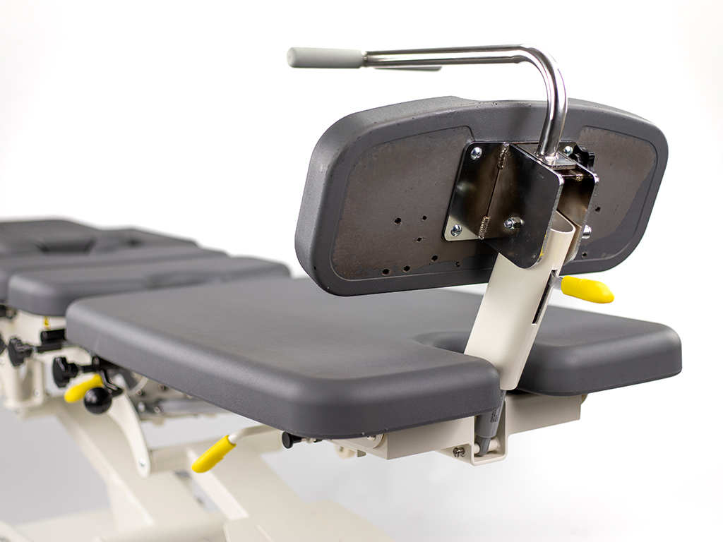 table de chiropraxie électrique habys avec drops ou toggle mécaniques vue appui-pied relevé couleur grise
