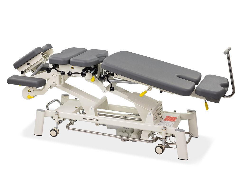 table de chiropraxie électrique habys avec drops ou toggle mécaniques vue têtière inversée couleur grise