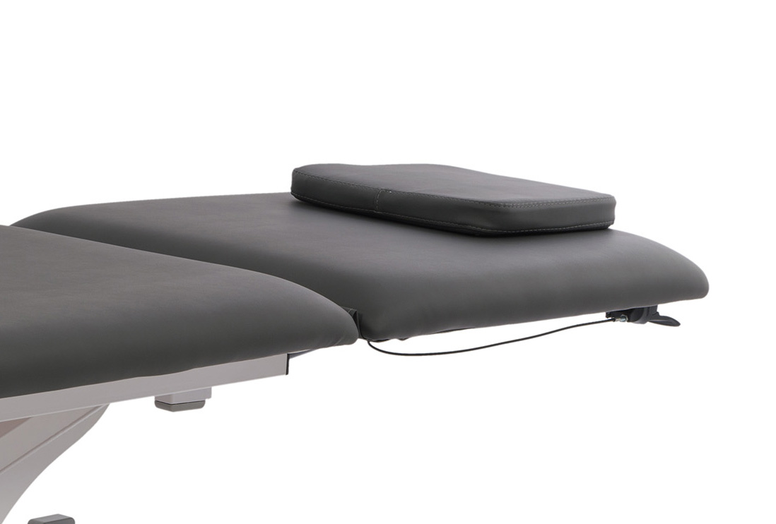 table-de-massage-electrique-torac-weelko-détail-coussin-de-nuque-bouchon-facial-tablelya