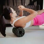 Athlète-récupérant-avec-rouleau-de-massage-Line Sport-Acus-Med-après-entraînement