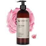 Huile de massage à la rose douce Reya Soft Rose HABYS – présentation avec rose en fond-tablelya