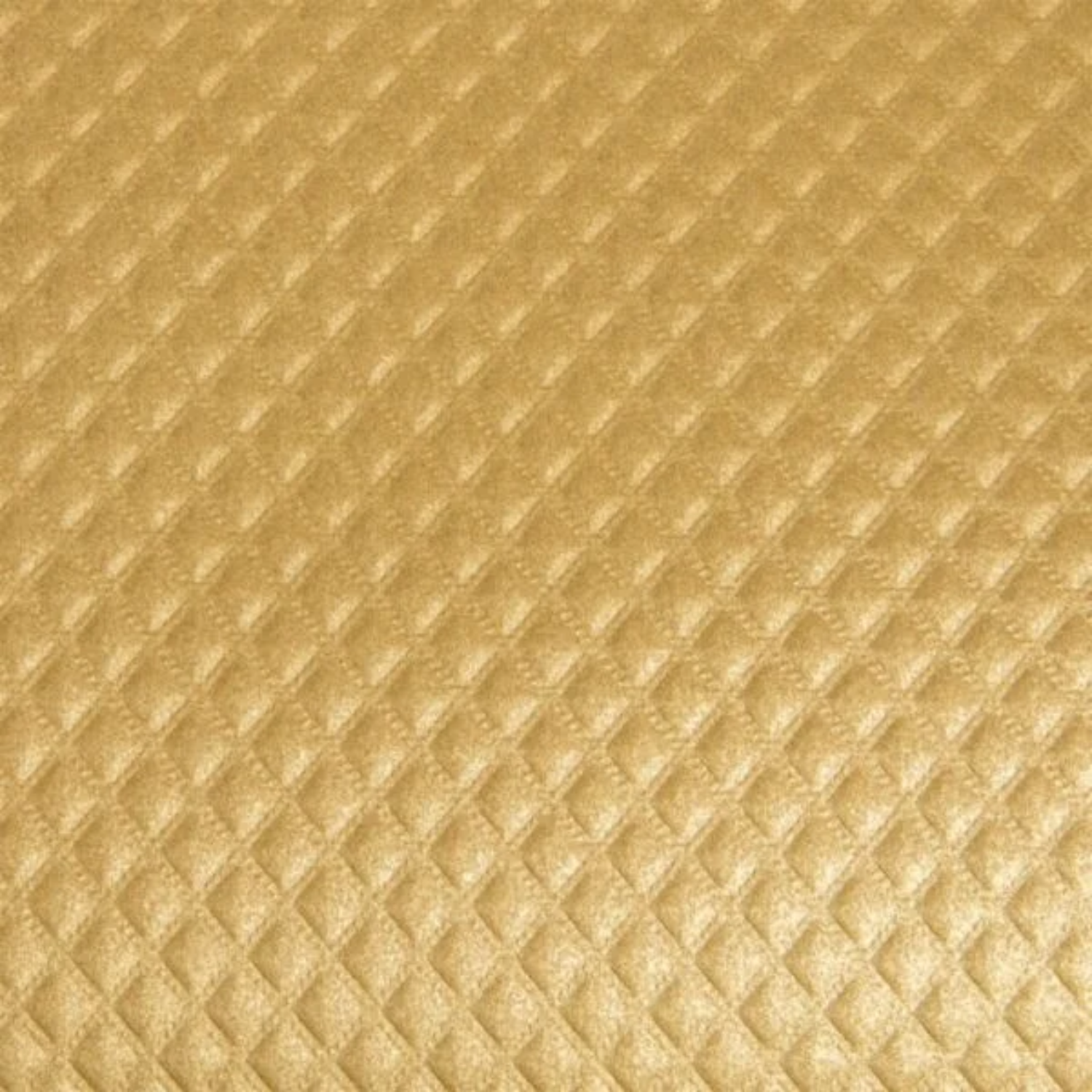 Gros plan du gaufrage en relief de la nappe dorée en papier