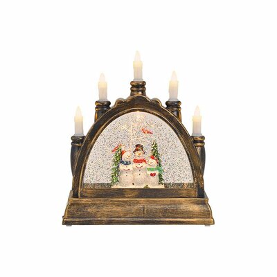 Arc avec lumière scintillante, musique, tourbillons de paillettes, décor bonhomme de neige
