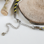 valentin-argent-mixte-noir-jaune-arriere