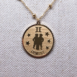 collier-femme-or-gemeaux-zoom