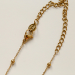 collier-or-astro-arriere-zoom