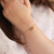 bracelet-femme-or-acier-coeur-aloha-porte