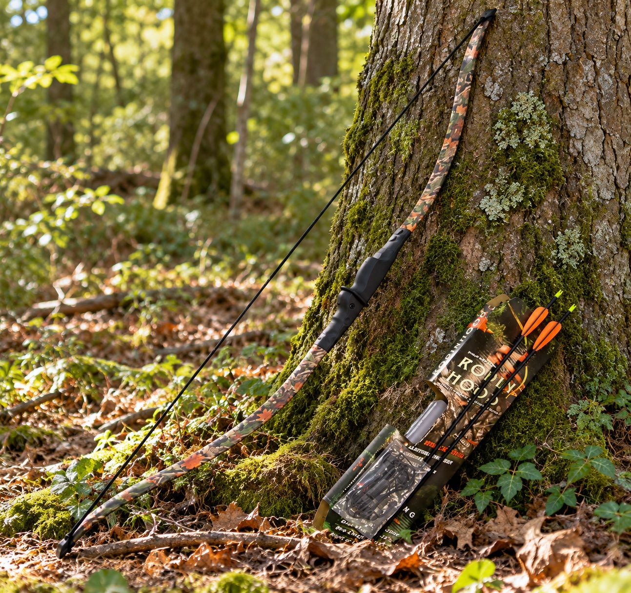 Arc Robin des Bois camouflage avec flèches posé dans une forêt