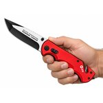 Couteau pliant Pompier K25 21 cm rouge tenu en main