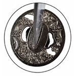 Garde de katana japonais Dragon avec gravures de dragons et motifs traditionnels en relief.