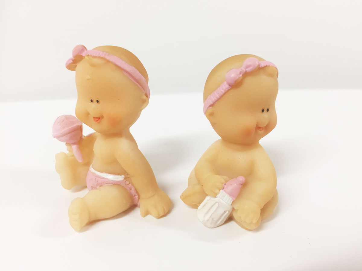 figurine-bebe-rieur-rose