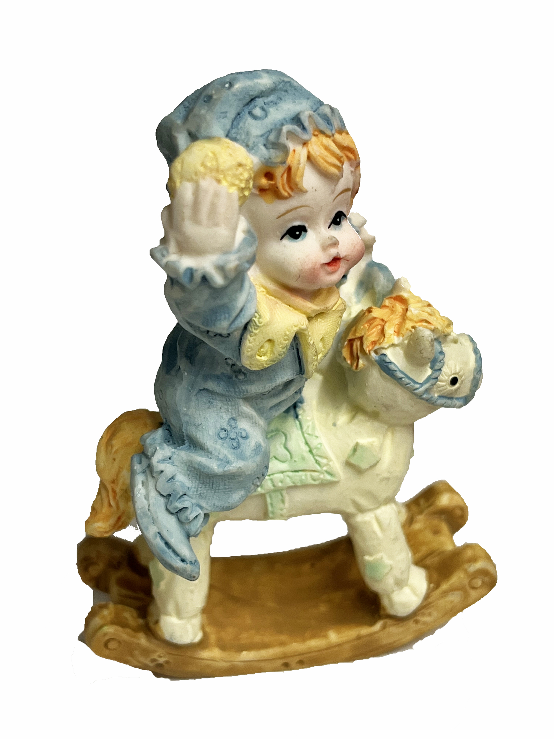 figurine resine bebe garcon sur chaval à bascule