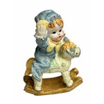 figurine resine bebe garcon sur chaval à bascule