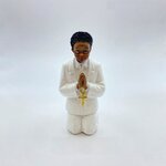 figurine communiant noir a genoux