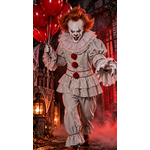 Déguisement de clown gris maléfique Halloween avec tunique à pompons rouges, pantalon bouffant, perruque rousse et ballons rouges.