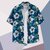 chemise hawaienne bleue avec hibiscus blancs 4