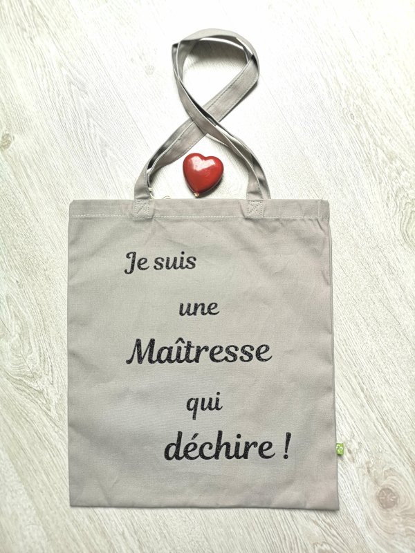 Tote bag gris je suis une maitresse qui déchire personnalisable